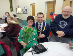 Viv receiving flowers